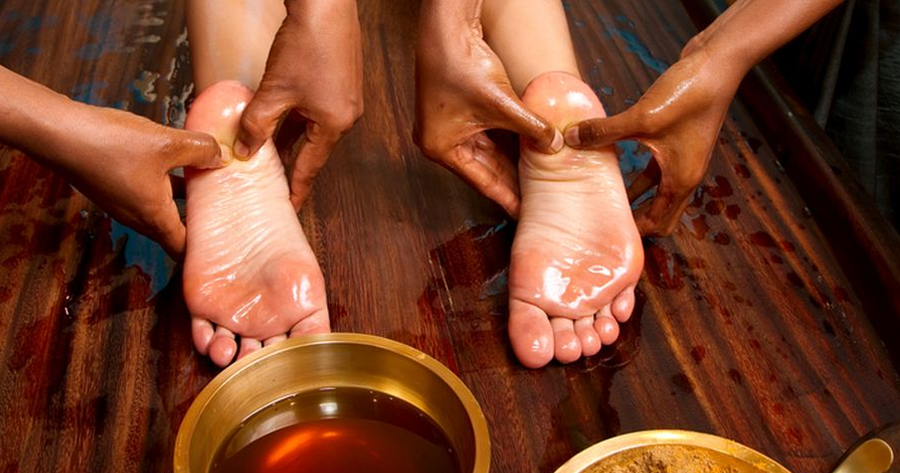Why is it important to massage your feet before bed?